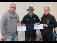 Barry receiving cheques from Darin & Rob